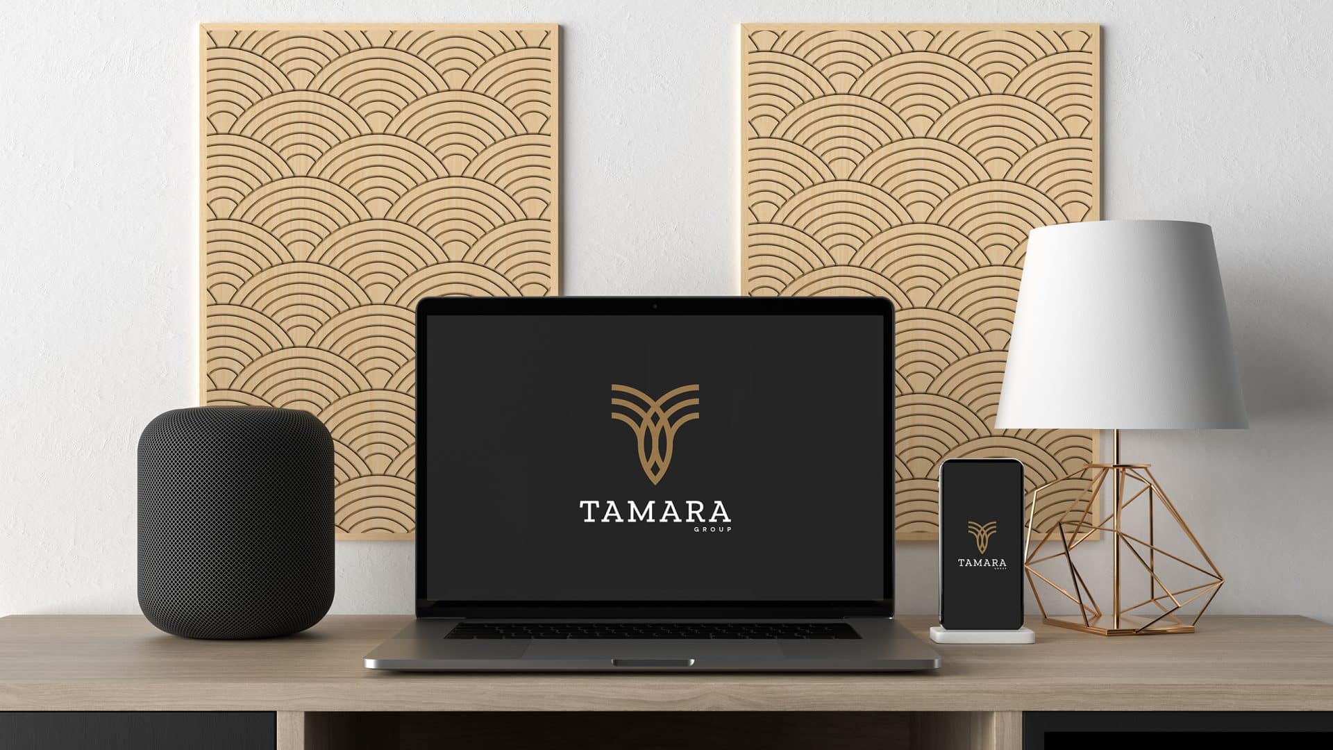 tamara brand on laptop and mopaile